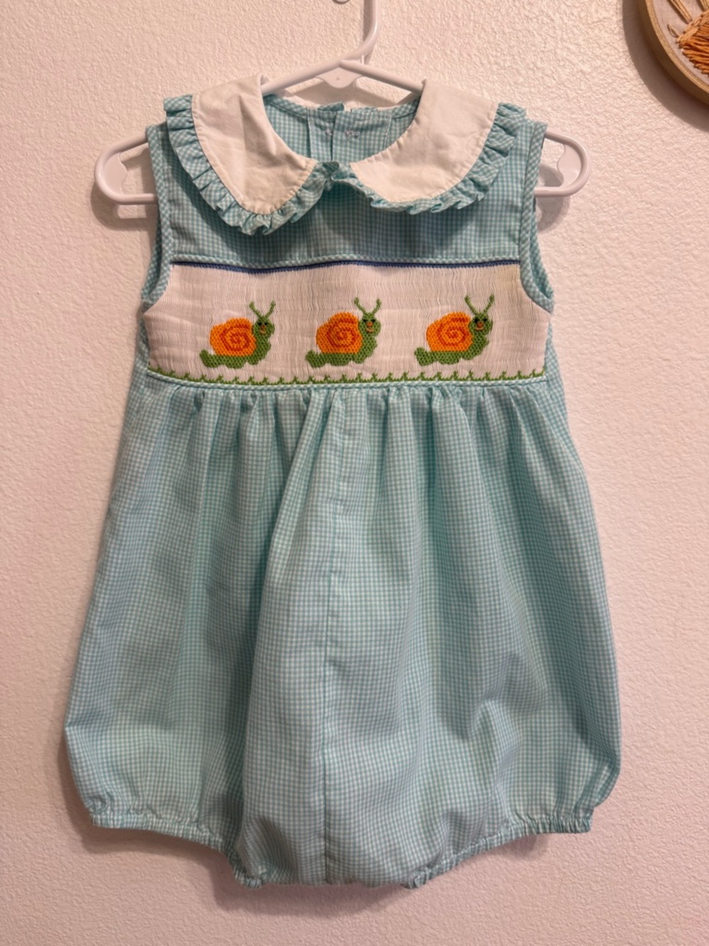 Hand-Smocked Light Blue Gingham Baby Romper with Snail Motif